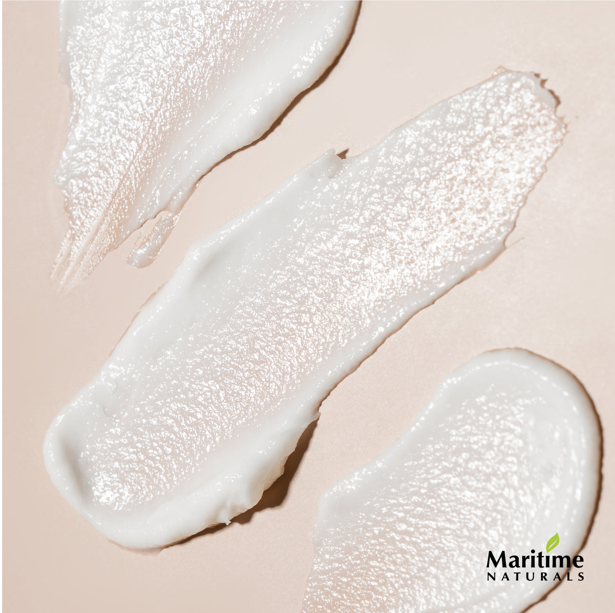 exfoliating scrub feels slightly sandy yet also cream, goes on to smooth skin and exfoliate gently